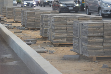 Packs or piles of tile for making road isle footpath