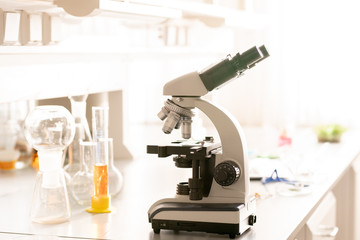 Modern microscope on desk