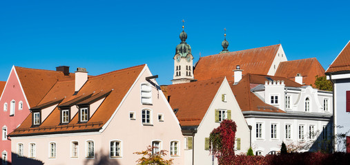 Fototapeta premium white houses in street called Alte Bergstrasse, in Landsberg am Lech, Germany