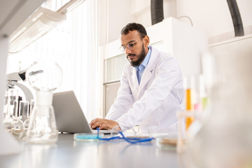 Working on research in laboratory