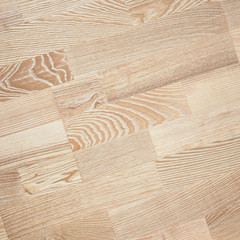 Fine natural solid valuable species of wood laminate parquet floor texture background. Wooden boards painted with natural oil, wax or mastic.