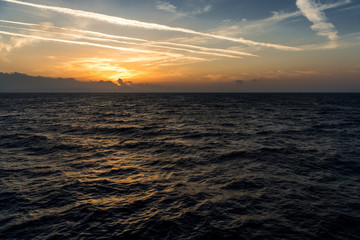 Sunset above sea