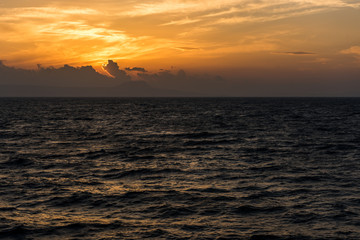 Sunset above sea