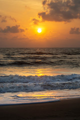 Fototapeta na wymiar sunrise on the beach with soft wave.