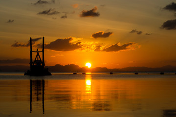 Sunset at the lake on the golden hour.