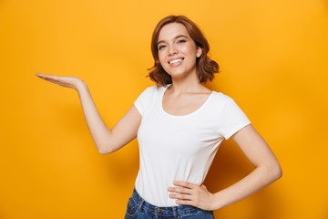 Cheerful young girl wearing t-shirt standing