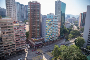 Fototapeta na wymiar High Office sky Building in Hong Kong island with stranger design.