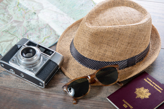 passports, map, summer hat and camera ready for holidays