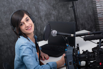young woman working on the radio
