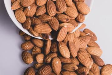 Almonds in a bowl close-up. Healthy food.