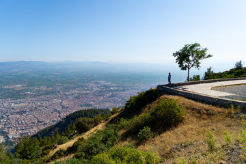 Fototapeta na wymiar Person looking at the city Manisa Turkey Mountain