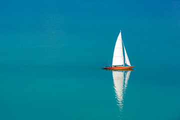 Sailing ship luxury yacht with white sails in the Sea