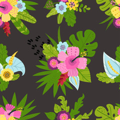 Obraz premium Seamless pattern with tropical leaves and flowers.