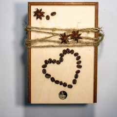 natural eco wooden box decorated with coffee beans, rope, anise