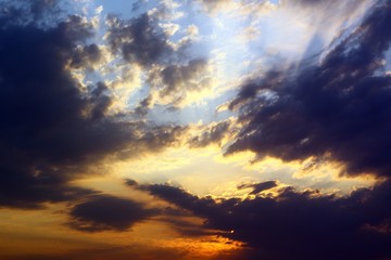 Fototapeta na wymiar beautiful vivid sunset or sunrise cloudy sky for using in design as background.