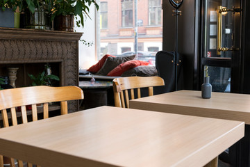 tables with chairs in the cafe,