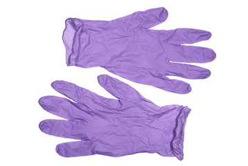 Medical latex gloves of violet color on a white background