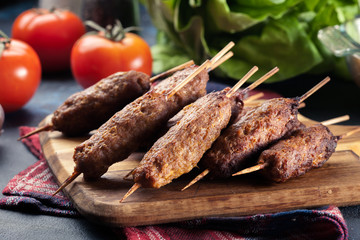 Grilled balkan cevapcici or  kebab on skewers