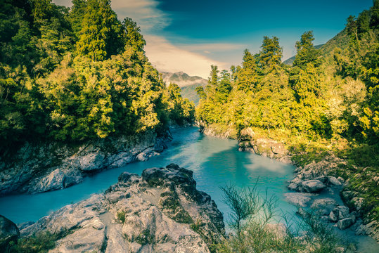 Blue glasier river through mountain