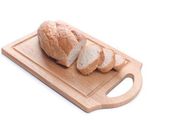 Sourdough Loaf at cutting board isolated