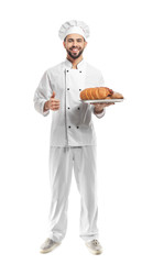 Chef with fresh bread on white background