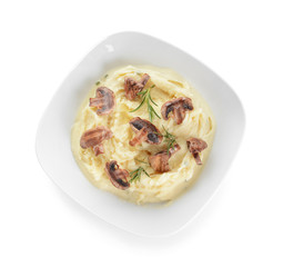 Plate with tasty mashed potato on white background