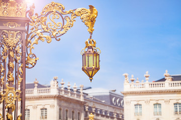 Fototapeta na wymiar Lamp on gates to Place Stanislas, Nancy, France