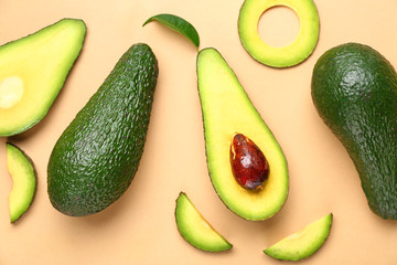 Fresh cut avocado on color background
