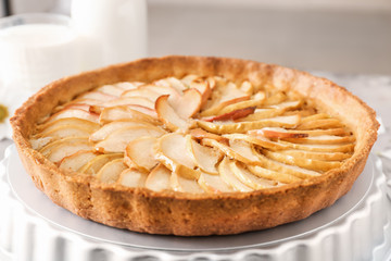 Tasty apple pie on table, closeup