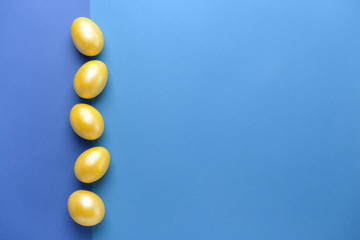 Beautiful Easter eggs on color background