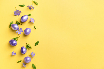 Beautiful Easter eggs on color background