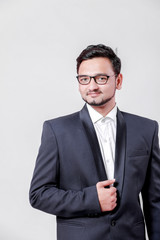 Young Indian / Asian businessman in suit