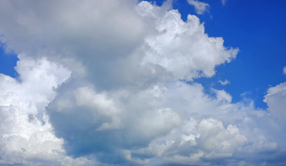 Blue sky with white cloud background.