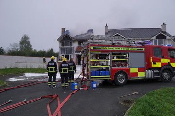 Fototapeta na wymiar Irish Fire brigade on action . Fire house Ireland .co Meath