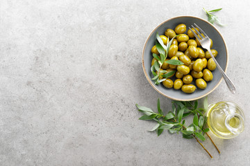 Green olives in a bowl
