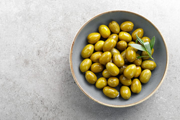 Green olives in a bowl