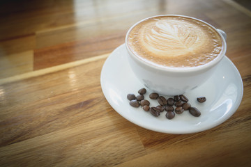 A cup of coffee in somewhere cafe.