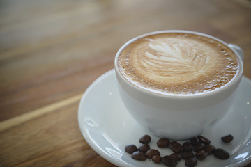 A cup of coffee in somewhere cafe.