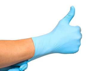 Doctor hand with glove showing like gesture or thumbup as approval, accept or done concept. White background