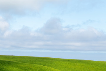 green field and blue sky Hokkaido Japan