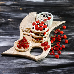 Homemade Crispbread toast with Cottage Cheese, berries. Flat lay. copy space