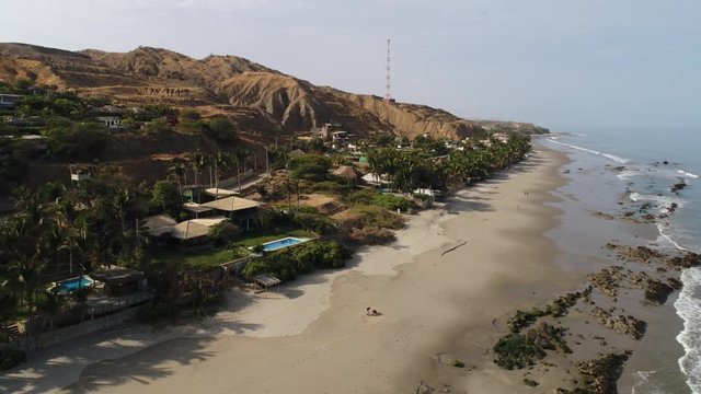 Aerial: Beach at Pacific Ocean. Mancora, Peru, South America