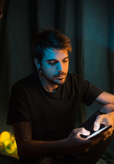 boy with phone chating at night tecnologic movil texting message young 