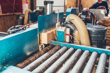 Machine for trimming and cutting spikes on a bar before gluing into a timber - sawmill - production of glued laminated timber