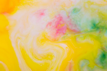 Multicolored acrylic paint. Abstract paint in milk