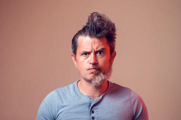 A portrait of man with half beard and hair
