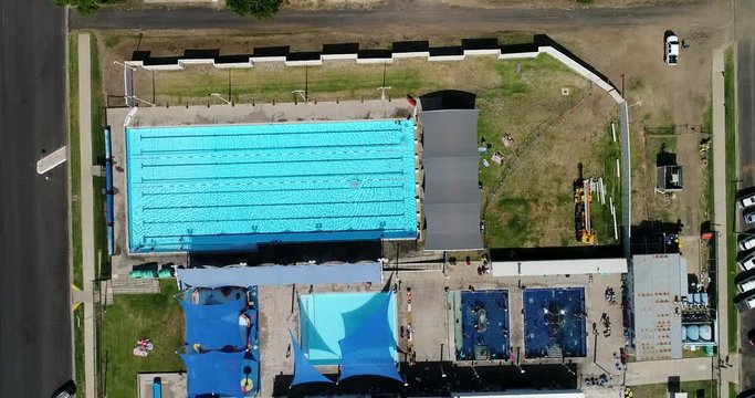 Aquatic centre with artesian water in Moree town &ndash; overhead view top down to swimming pool and spa complex with hot artesian water.