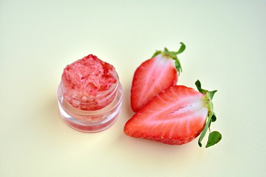 Diy natural lip scrub with brown sugar, coconut and strawberries.