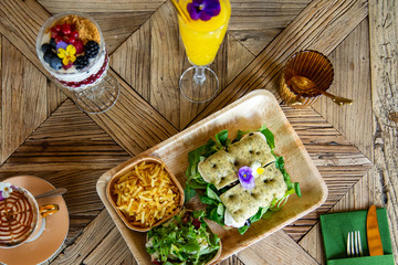 brunch with mimosa cocktail on Wood table