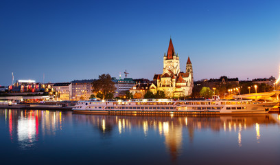 Saint Francis of Assisi Church on Danube in Vienna, Austria at night